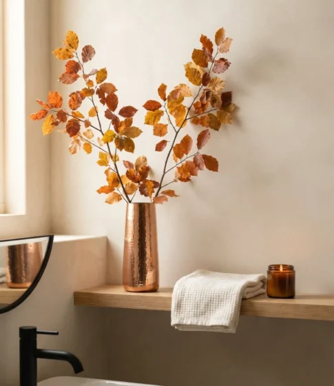 Copper Vase with a Single Branch of Autumn Leaves